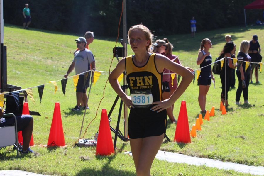 Sophomore Allison Vernon cools down after finishing her run at Sioux Passage on Sept. 15