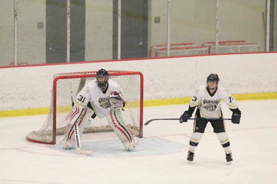 Senior Drake Johnston and junior goalie Charlie Jones guard the goal in a match against Fort Zumwalt South