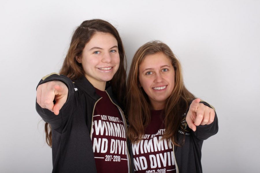 Swim team captains sophomore Olivia Neunaber and senior Hannah Miller stand together and show leadership and sportsmanship. Neunaber and Miller were chosen by the team to be captains for the 2018 winter season. As captains, they will communicate with coaches, lead practices and more.