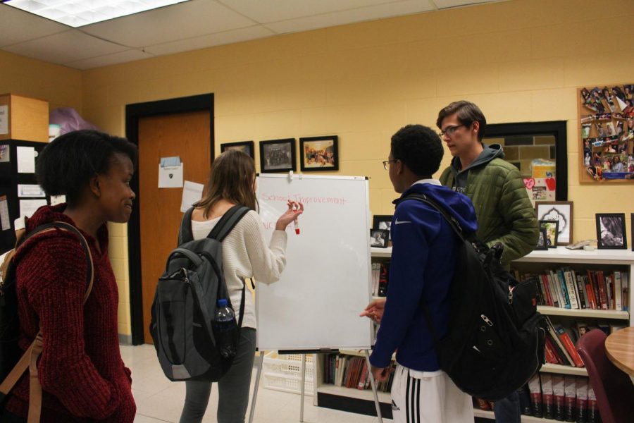 StuCo members brainstorm ways to help improve the school. They are currently
planning for the Snowcoming dance, raising money for the Siteman Cancer Center and preparing the school store. They are also looking to recruit more members in
order to build a bigger community.