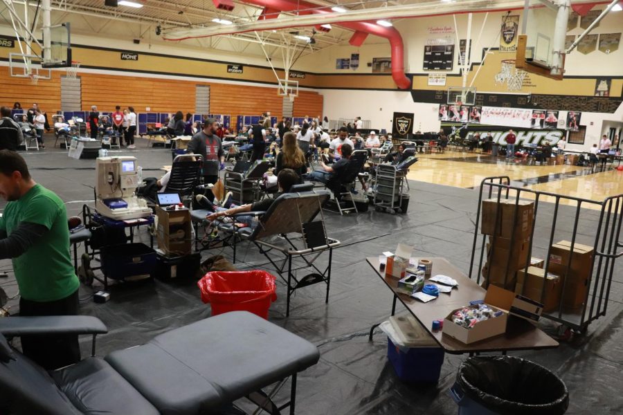 Students scatter at different stations all over the FHN Gym for the blood drive. The stations are placed in an order to ensure that students are able to safely donate blood. The blood drive was open for students and teachers from 8:00 a.m. to 1:00 p.m.