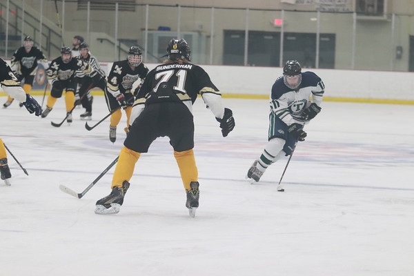 Sophomore Jacob Sunderman defends his opponent. Jacob Sunderman is a pool player from Pattonville high school, and played defenseman for the Knights.