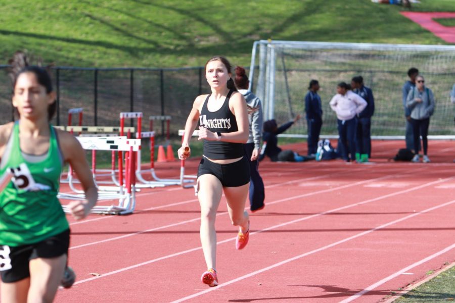 Senior Mackenzie Pugh runs her leg in the 4x800 race at the Henle Holmes Invitational. Pugh will be running cross country and track at SEMO.