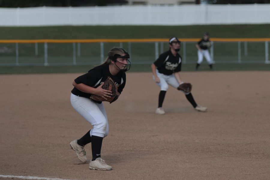 Junior Ella Pardo prepares to pitch in game against the Francis Howell Vikings.