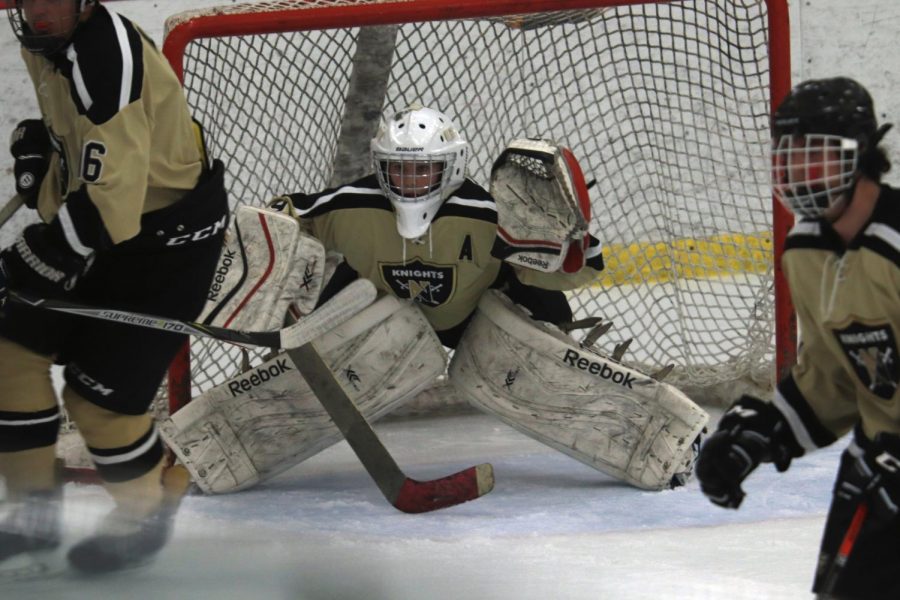 Sophomore goalie Max Bante defends goal in gold cup game.