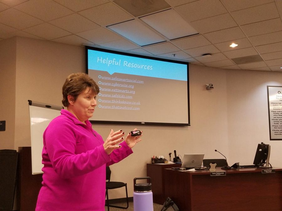 Prevention Education Specialist Karen Loesch teaches parents about resources they can use to monitor their child's online safety. (Photo by Chloe Horstman)