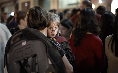 A child waits in line during a Harry Potter event.