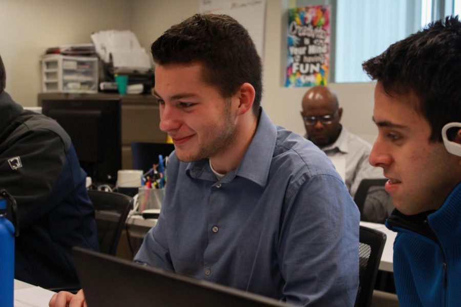 Senior Tanner Burke works on a project at CAPS. Students enrolled in CAPS are given many resources to learn new skills and develop their talents. Some resources include the Adobe Creative Suite and online learning programs like Grok Learning and Pluralsight.