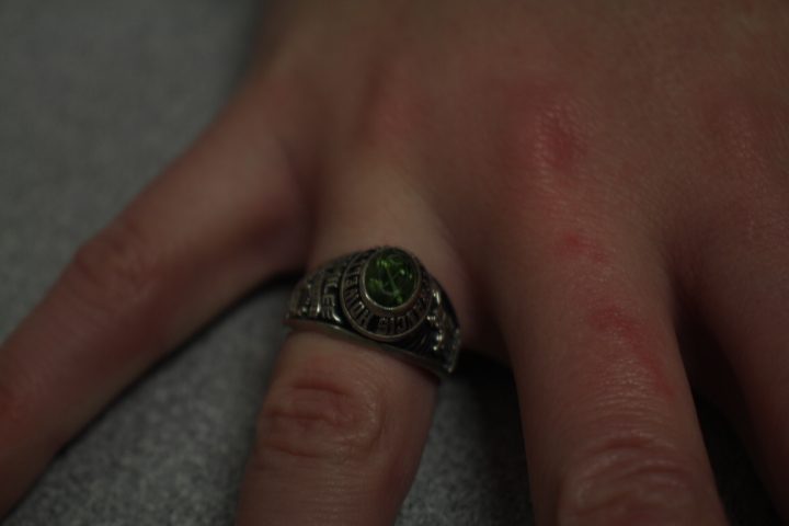 Senior Emilee Statzer holds in her hand the class ring she customized. Francis Howell North offers students an opportunity to buy a class ring that they get to customize. During the school day students who ordered a ring get to go down to the ring ceremony to receive their rings. (Photo by Kaili Martin)