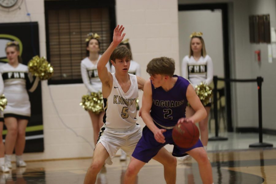 The opponent from Fort Zumwalt West tries to pass the ball but senior Ben Oster prohibits him from passing.
