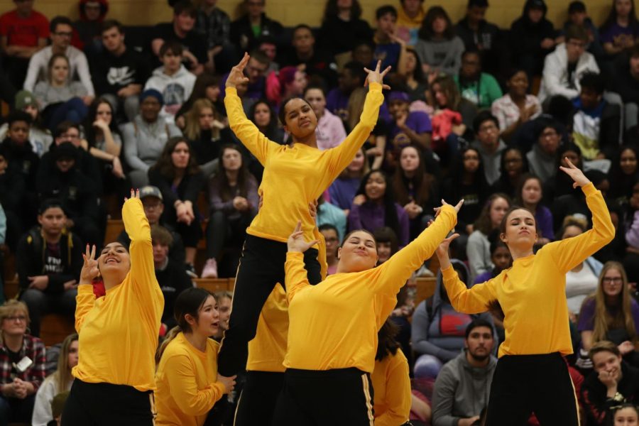 Junior Varsity Knightline strikes a fierce pose during their performance. 