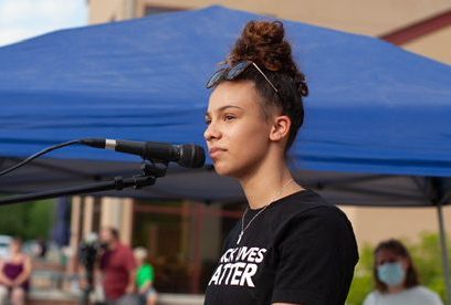 Mya Walker stands in front of hundreds of people as she gives her speech at the Calvary Church.