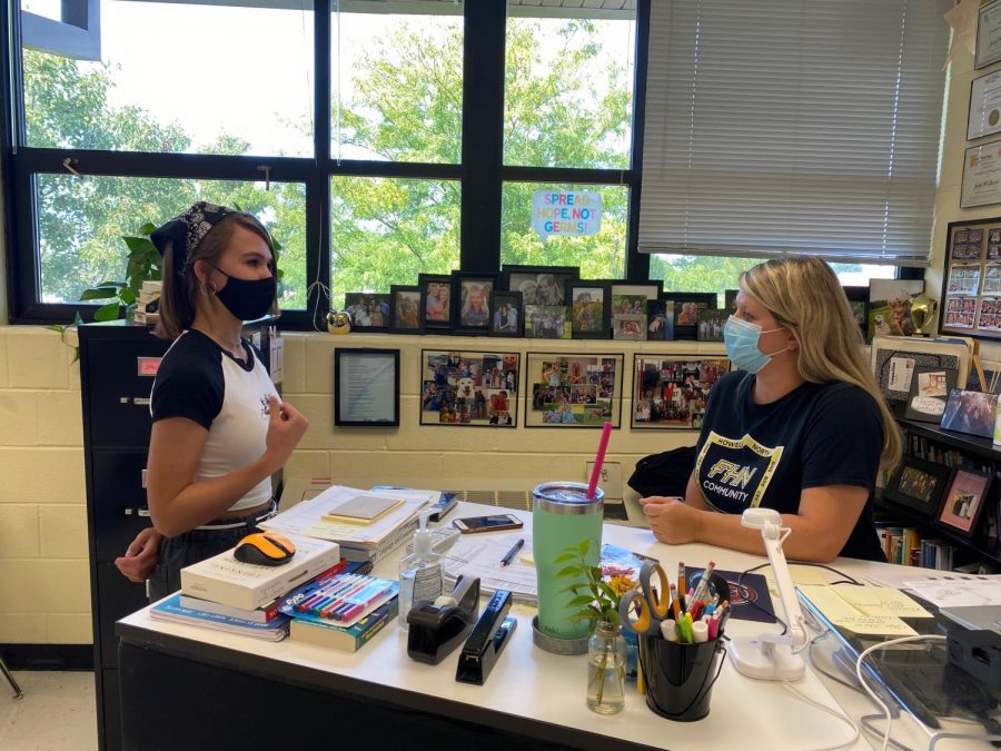 StuCo president Caroline Blanke sits with StuCo sponsor Jani Wilkens.