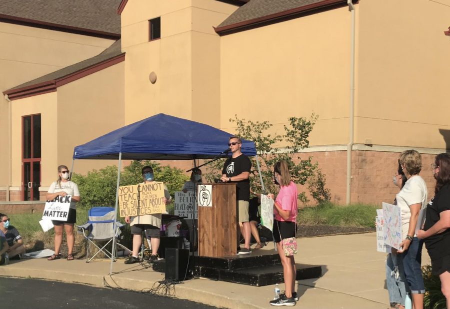 Head principal Nathanael Hostetler speaks at the Black Voices Matter march over the summer. 