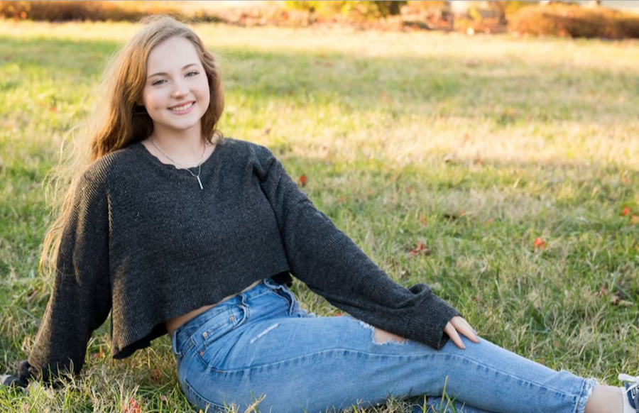 Grace Varvera poses for her senior pictures. She participates in online activism through her social media.