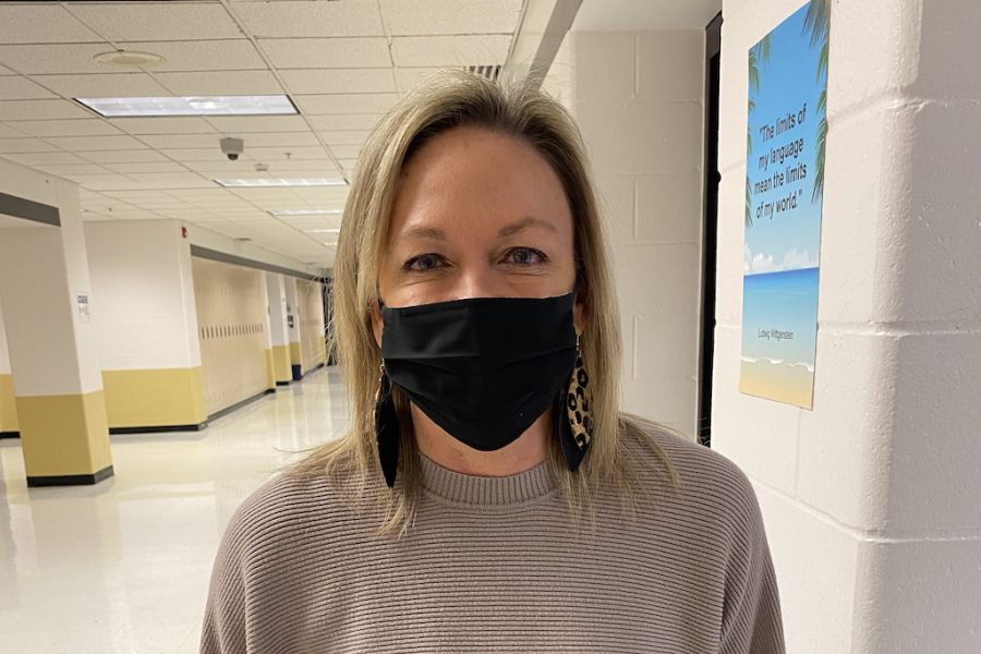 FHN math teacher Amy Murray stands in the hallway outside of her classroom