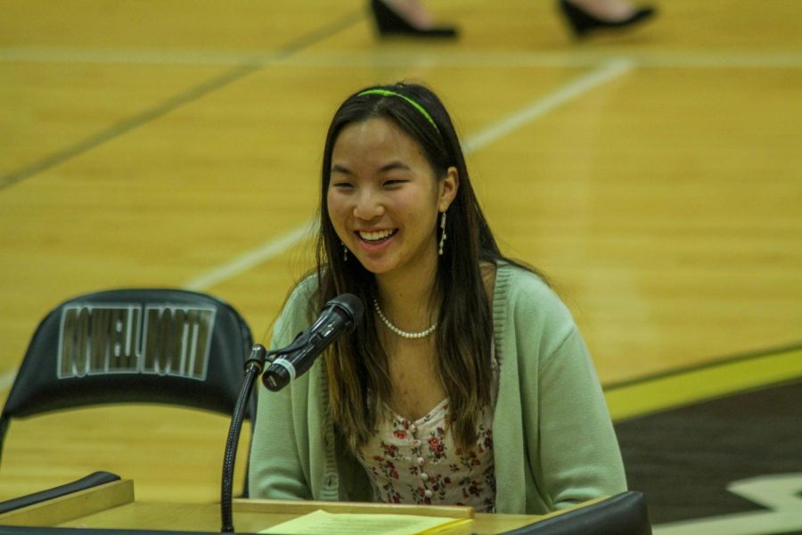 Sophomore Hailey Zhang states her personal motto during the induction.