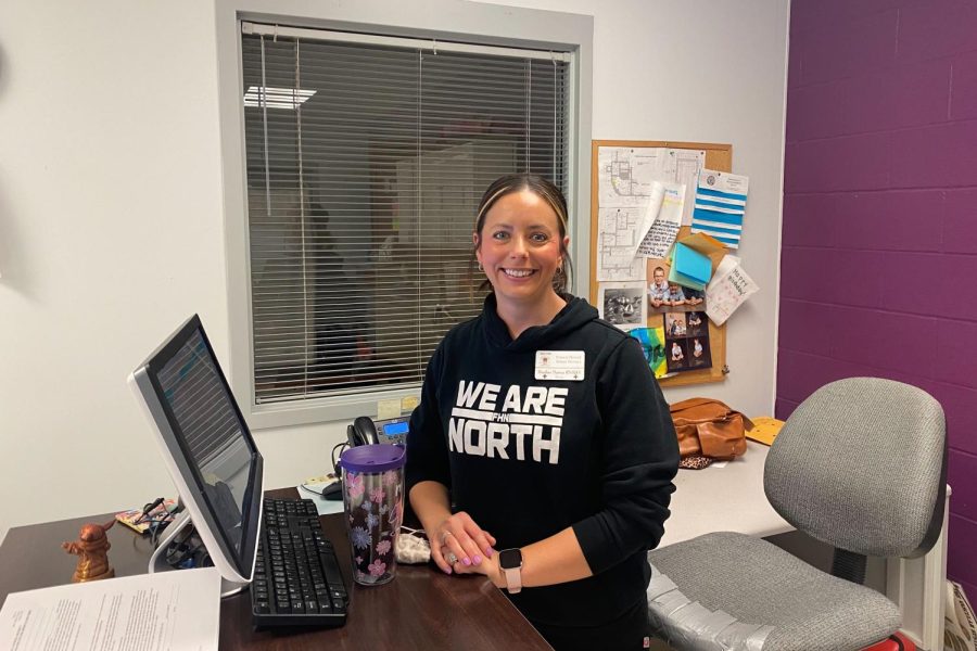 FHN Nurse Heather Marren sits at her desk in the nurse's office. 