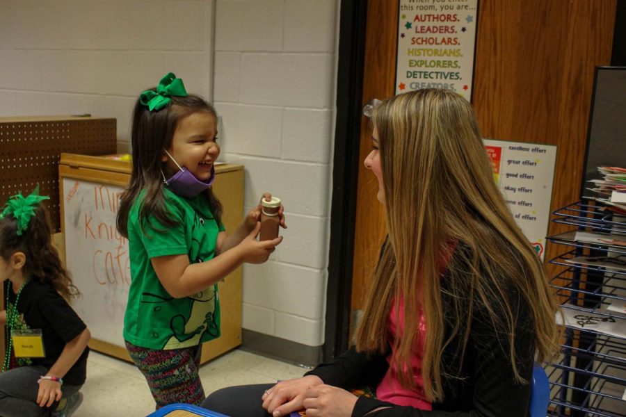 Student Maddison Musil plays kitchen with a child a part of the Mini Knights preschool program located in room 136 every Tuesday, Thursday, and Friday. This program has a $50 fee and takes place Feb. 25 through Apr. 24. They watch children ages three to five and practice hands-on learning to get children ready for kindergarten. To see more photos.