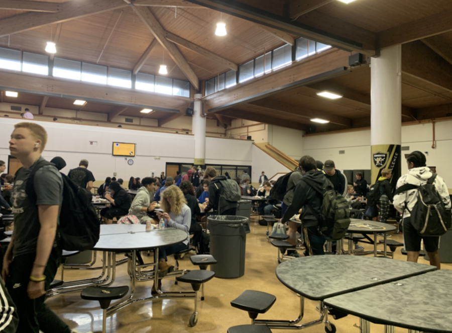 Students prepare to eat lunch in the cafeteria