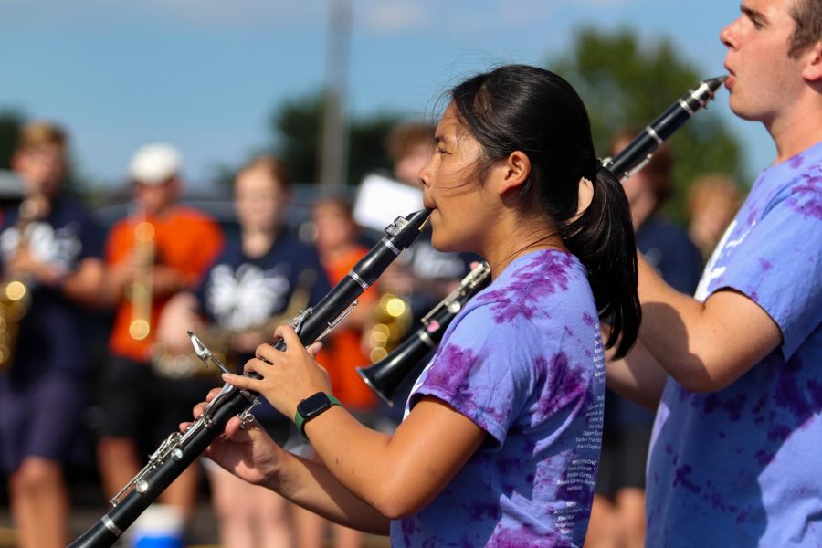 Senior Kaitlyn Le plays the clarinet during the band's performance at Black and Gold Day on Aug. 20.