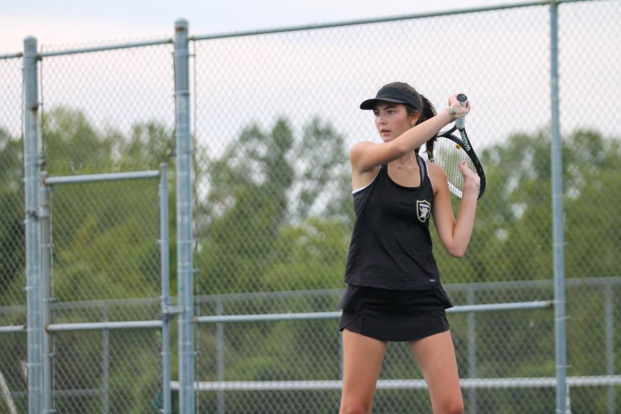 Senior Maggie Koester prepares for her swing.