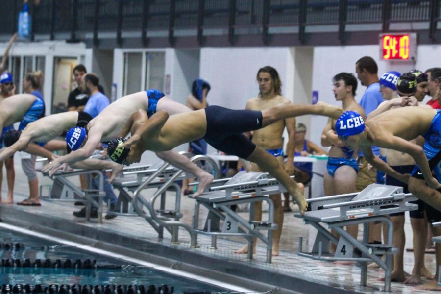 Varsity Boys Swim Falls to Lutheran High [Photo Gallery]