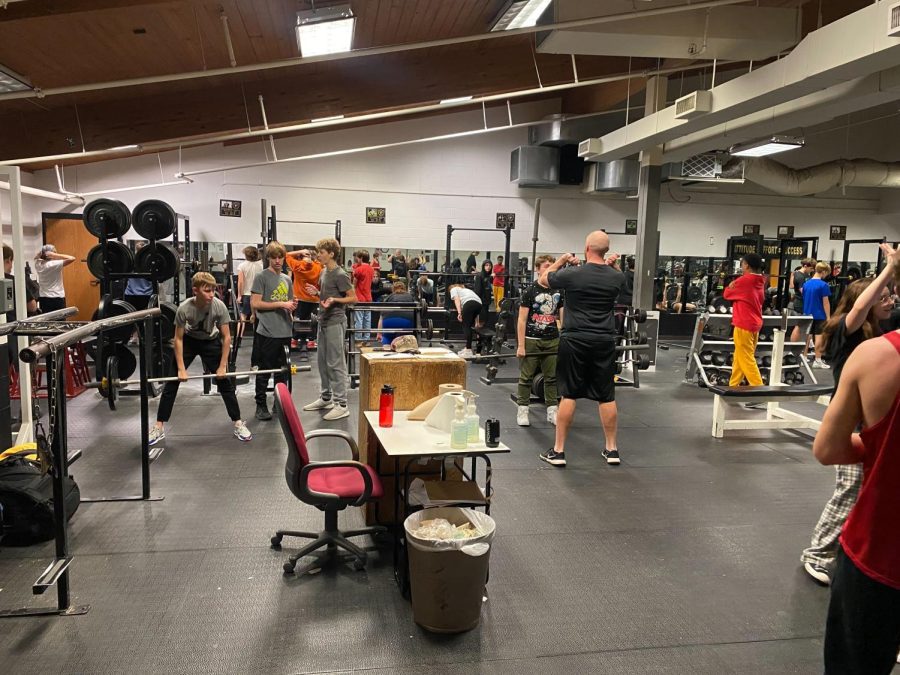 The Iron Knights are Working Out in the Weight Room.