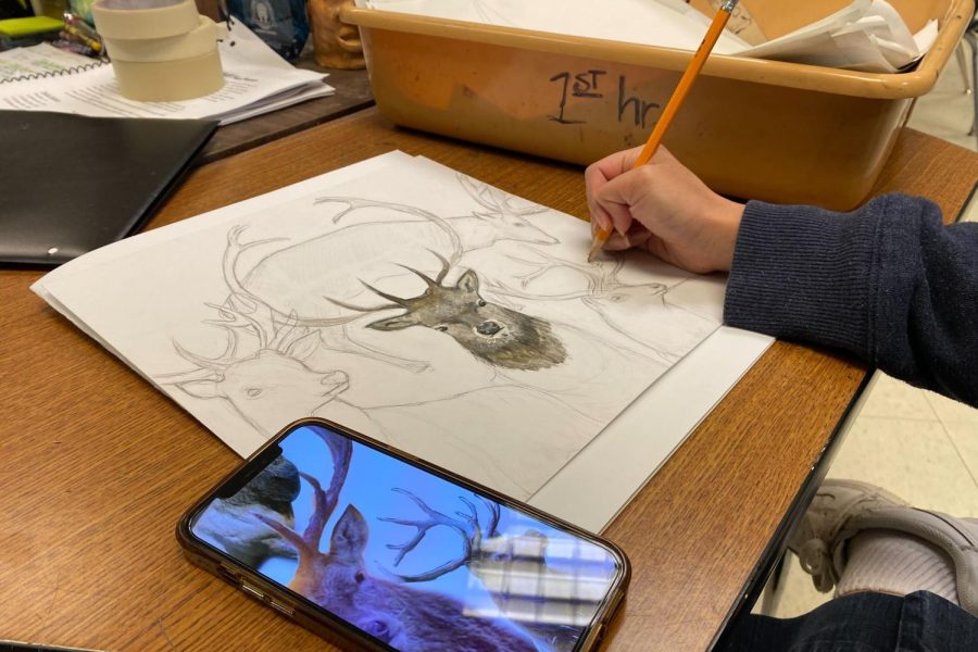 Sophomore Cherry Ann Clark sketches a deer before school in Mrs. Maples class. Maples teaches many art classes at FHN. 