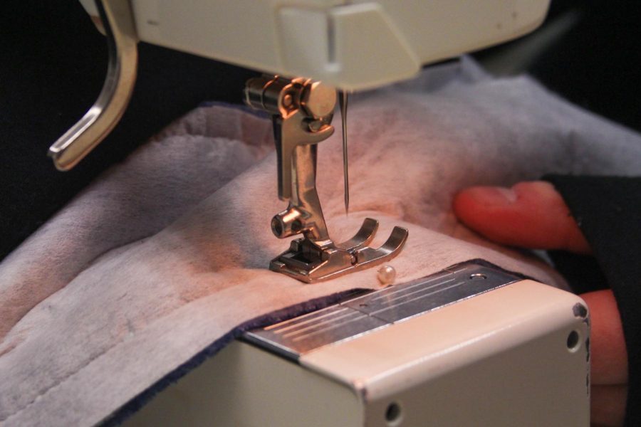 Rory Marable sews the collar of her fleece jacket project on Dec. 16. Fashion Construction I has been working to finish their fleece jacket projects on Jan. 6. They’ve been taught many skills, like how to sew with interfacing, how to sew on a zipper, and how to do many sewing techniques.