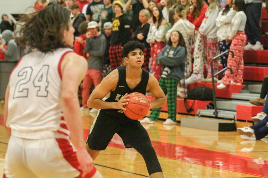 Shooting Guard Nikhil Contractor looks to shoot the ball during a game. 