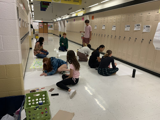 FHN Student council preps for the pep assembly by painting signs for all of the fall sports teams. 