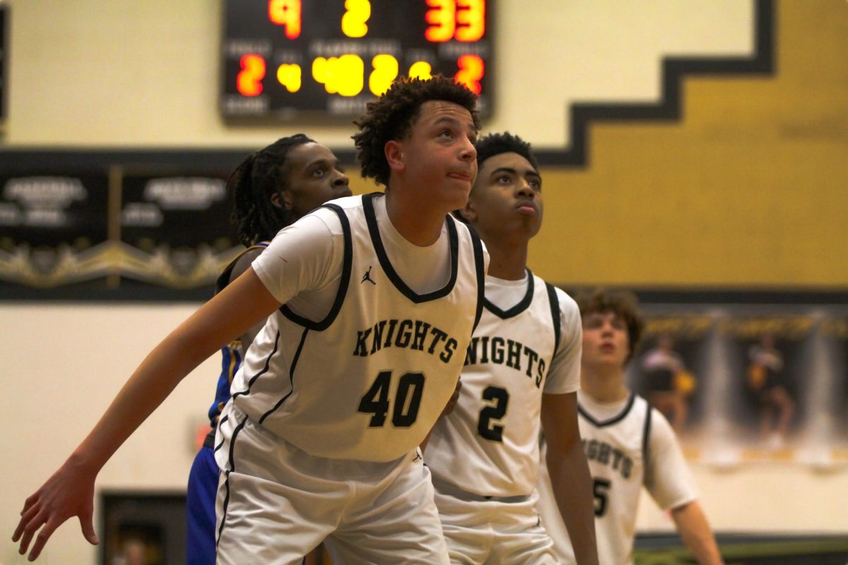 Jackson Calhoun waits for a rebound during the Pink Out game on Jan. 19.  Calhoun would go on to score 15 of the teams 28 points,