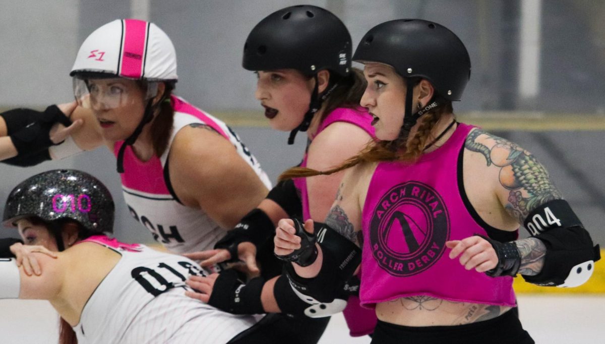 Skaters watch as a jammer skates past them during the final scrimmage on Feb. 17. While both teams work to help their own jammer get around the track, they're also trying to keep the opposing jammer from getting anywhere. At the beginning of each jam, players from both teams link arms together and both fight against and work together with each other in order to assist their jammer and stop the opposing jammer. While there are many roller derby leagues around the United States and the world, players have to find the team that fits best with them for this strategic and intense sport.

"We have people from all over, people who travel to play with our league, that are more than 2 hours away," ARCH player Carol Hopfinger said. "And it's always we're always able to meet with each other and still feel respected and welcomed in the league."
