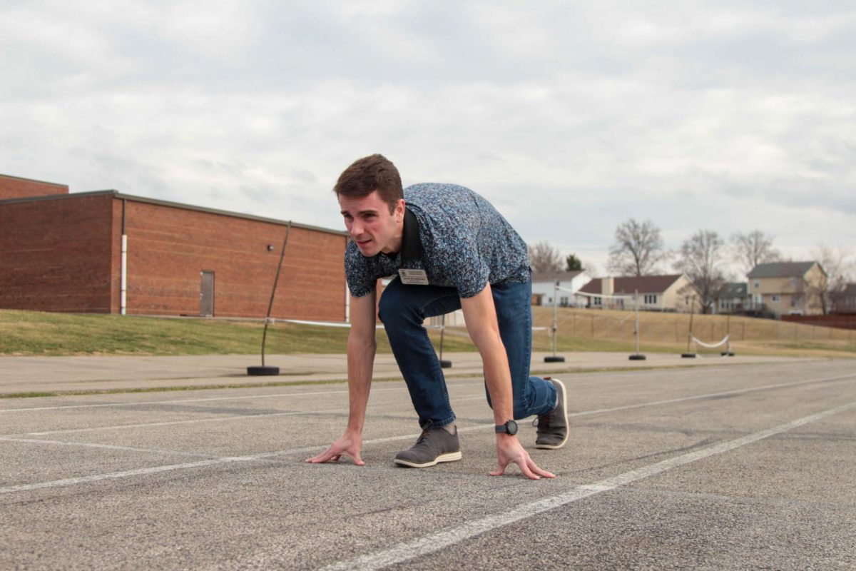 Jerod Broadbooks gets into a starting position on the Barnwell Middle School track. Broadbooks had to find odd times to run during his preparation for the Olympic Trials and would often run during any off time he had between his teaching career and his personal life.