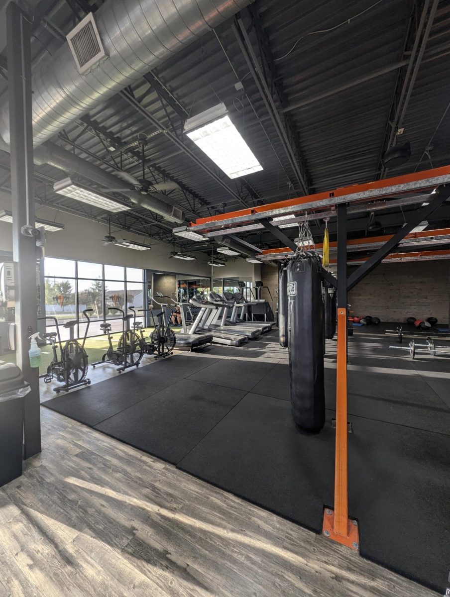 Individuals workout at Emerge Fitness Training facility in Wentzville, on Sept 19. Emerge is a small business that is ran by Matt Pirtle and it has two locations, one Wentzville and one in St. Charles. You can do group classes or personal one on one training sessions.