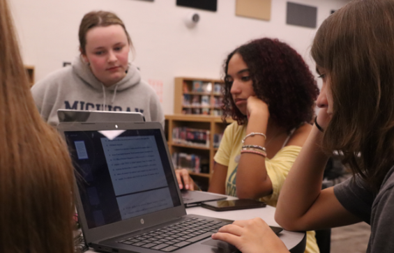 Mock Trialers work together during one of their meetings in the Learning Commons in order to prepare for their first trial in January.