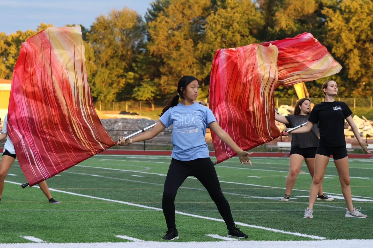 On Sept. 30, FHN Colorguard practices their routine during a marching
band practice on the home stadium field.