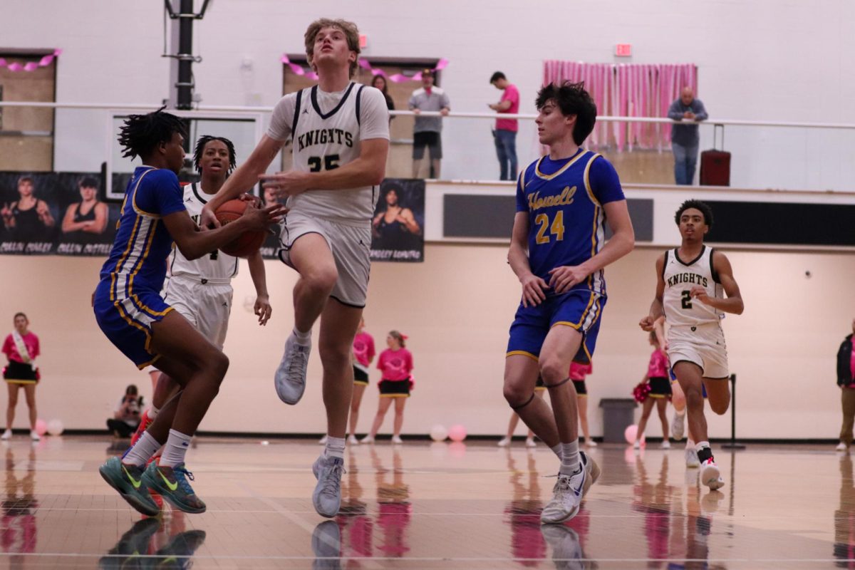 Boys Varsity Basketball Falls To FHHS During Annual Pink Ribbon Game [Photo Gallery]