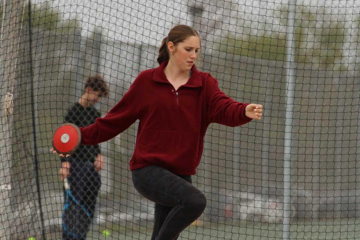 Rachel Bruemmer prepares to throw discus during practice with FHC.