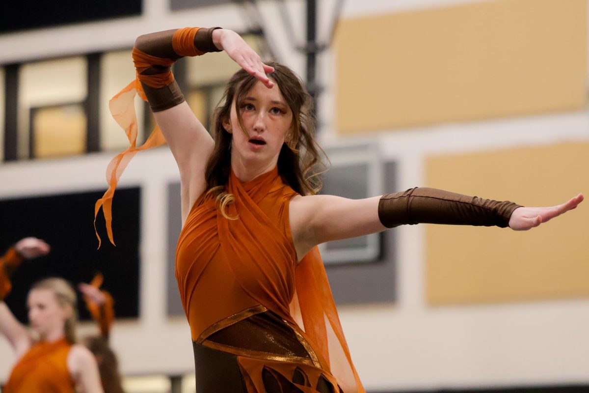 Junior Rylee Riggs performs “A Global Truth” for the annual parent preview on Feb. 6.