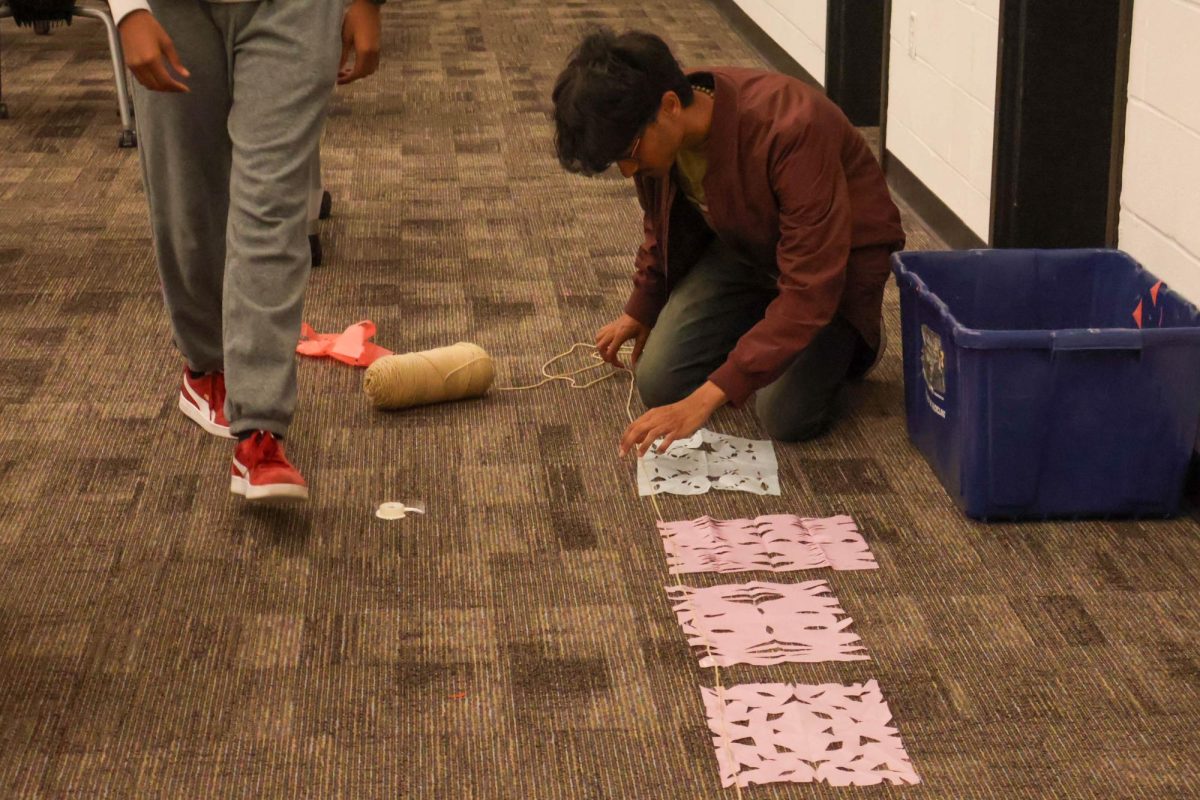 On Oct. 8 Mac Scholars held a meeting in the library to work on decorations for Culture Night.