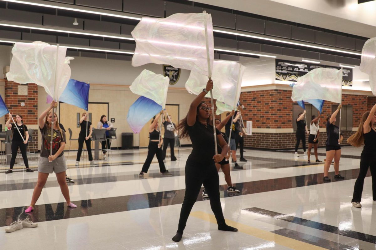 Winter guard practices after school outside of the main gym.