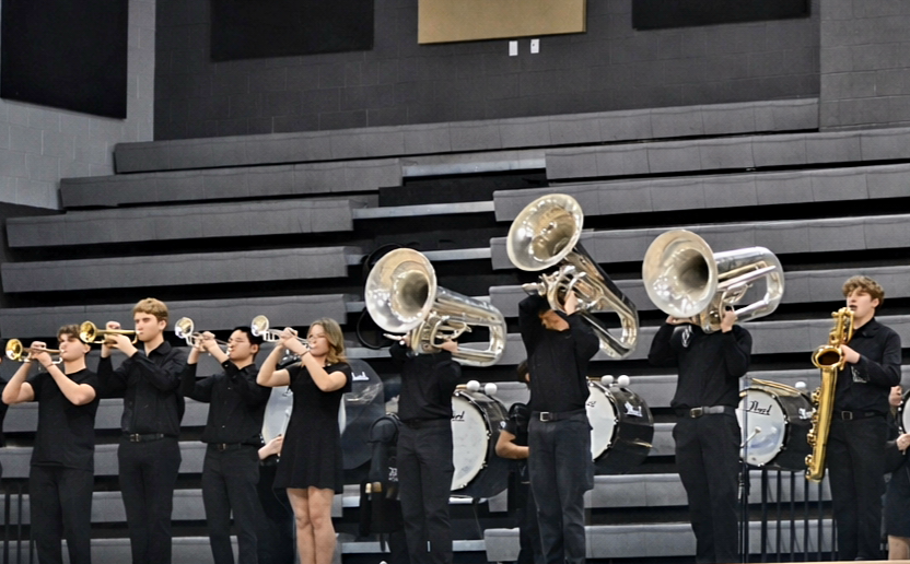 FHN band members perform alongside students form Barnwell and Hollenbeck middle schools up in the bleachers. This performance helped many middle schoolers find confidence while performing in front of hundreds of people.